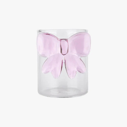 Verre Lepelclub au nœud rose, vue de face sur fond gris clair